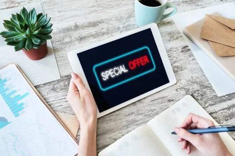 Special offer message on device screen. Sales and marketing, promotion and Stock-Fotos