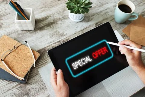 Special offer message on device screen. Sales and marketing, promotion and Stock-Fotos