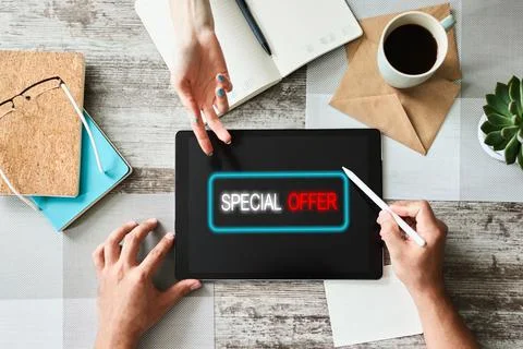 Special offer message on device screen. Sales and marketing, promotion and Stock-Fotos