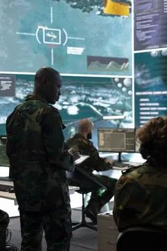 Special operations engineer examining surveillance CCTV footage 스톡 사진