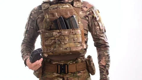 Special operations officer removes a loaded magazine from a pouch 動画素材 158012693