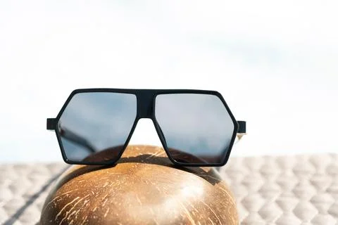 Special Oversized sunglasses model with flat black lenses and black frame shoot Stock Photos