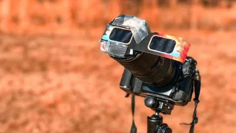 A special protected professional camera looking at the sun during a solar e.. Fotos Stock