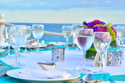Special romantic dinner at the beach Stock Photos