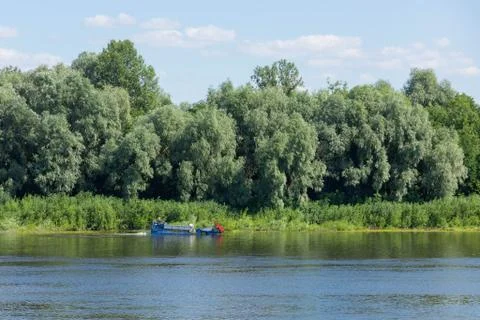 Special ship, working platform on the river. Cleaning of riverbeds and cleani Stock-Fotos