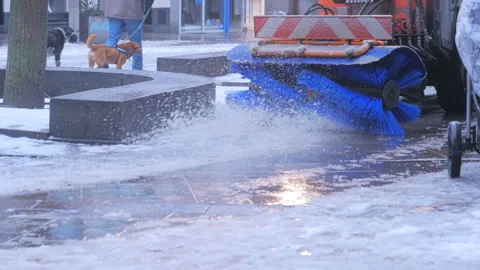Special snow blower machine removing snow from city street. Stock Footage 96225559