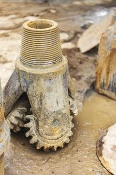 Special tool for drilling rig work on construction site. Close-up. Photos