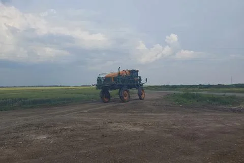 Special tractor with high wheels for, applying fertilizers and chemicals fo.. Fotos Stock