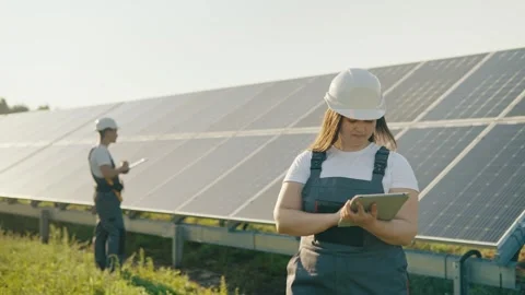 Special workers for maintenance and solar panels on the farm Stock Footage 251564924