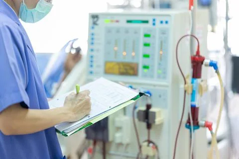 The specialist are checking continuous renal replacement therapy equipment an Stock Photos