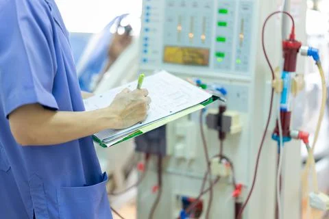 The specialist are checking continuous renal replacement therapy equipment an Stock Photos