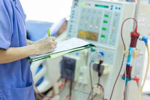 The specialist are checking continuous renal replacement therapy equipment an Stock Photos