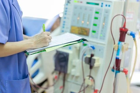 The specialist are checking continuous renal replacement therapy equipment an Stock Photos