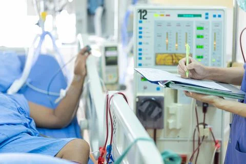 The specialist are checking continuous renal replacement therapy equipment an Stock Photos