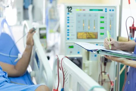 The specialist are checking continuous renal replacement therapy equipment an Stock Photos