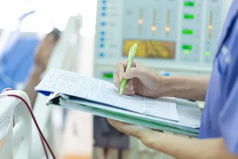 The specialist are checking continuous renal replacement therapy equipment an Stock Photos