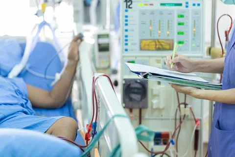 The specialist are checking continuous renal replacement therapy equipment an Stock Photos