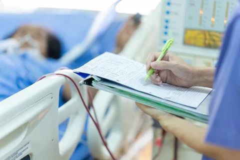 The specialist are checking continuous renal replacement therapy equipment an Stock Photos