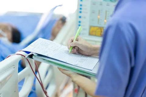 The specialist are checking continuous renal replacement therapy equipment an Stock Photos