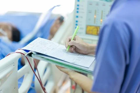The specialist are checking continuous renal replacement therapy equipment an Stock Photos