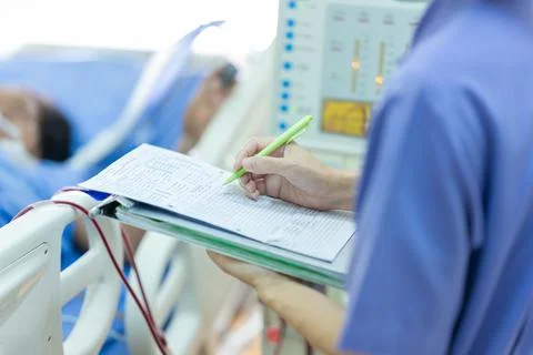 The specialist are checking continuous renal replacement therapy equipment an Stock Photos