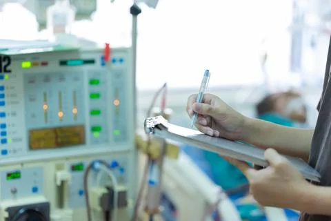 The specialist are checking continuous renal replacement therapy equipment an Stock Photos