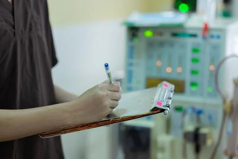 The specialist are checking continuous renal replacement therapy equipment an Stock Photos
