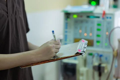 The specialist are checking continuous renal replacement therapy equipment an Stock Photos