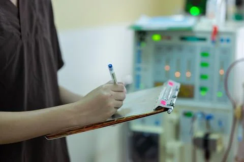 The specialist are checking continuous renal replacement therapy equipment an Stock Photos