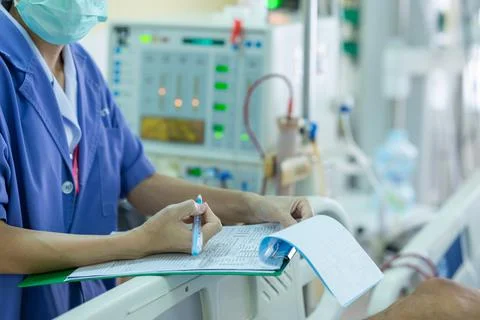 The specialist are checking continuous renal replacement therapy equipment an Stock Photos