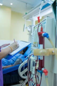 The specialist are checking continuous renal replacement therapy equipment an Stock Photos