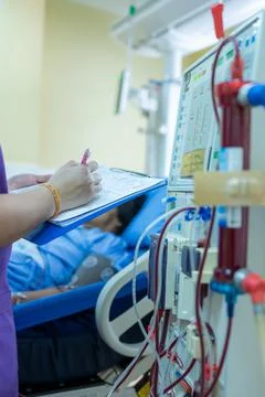 The specialist are checking continuous renal replacement therapy equipment an Stock Photos