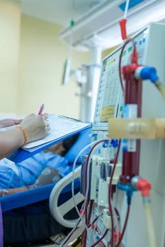 The specialist are checking continuous renal replacement therapy equipment an Stock Photos