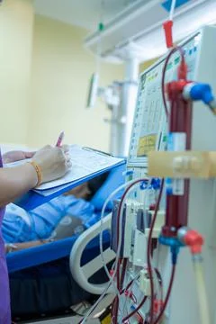 The specialist are checking continuous renal replacement therapy equipment an Stock Photos
