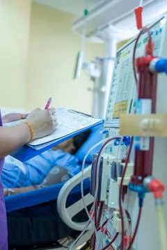 The specialist are checking continuous renal replacement therapy equipment an Stock Photos
