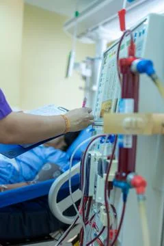 The specialist are checking continuous renal replacement therapy equipment an Stock Photos