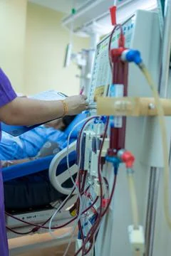 The specialist are checking continuous renal replacement therapy equipment an Stock Photos