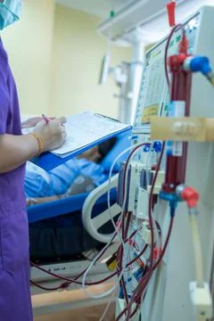The specialist are checking continuous renal replacement therapy equipment an Stock Photos
