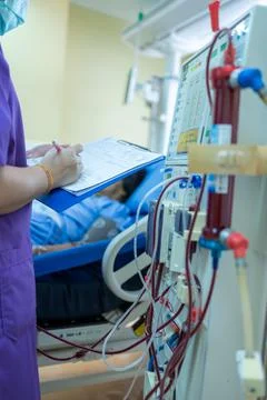 The specialist are checking continuous renal replacement therapy equipment an Stock Photos