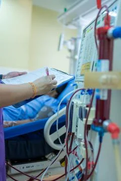 The specialist are checking continuous renal replacement therapy equipment an Stock Photos