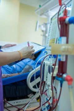 The specialist are checking continuous renal replacement therapy equipment an Stock Photos