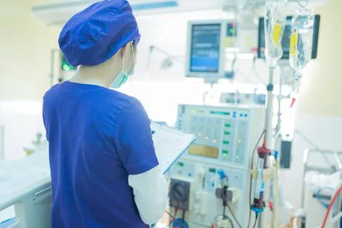 The specialist are checking continuous renal replacement therapy equipment an Stock Photos