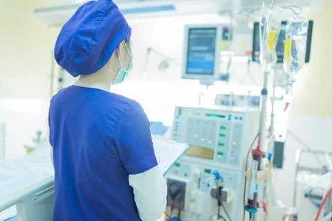 The specialist are checking continuous renal replacement therapy equipment an Stock Photos