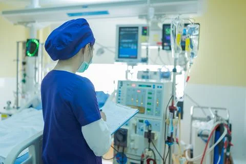 The specialist are checking continuous renal replacement therapy equipment an Stock Photos