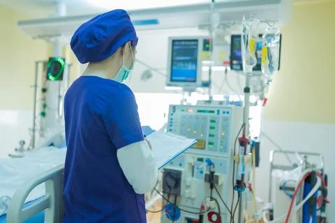 The specialist are checking continuous renal replacement therapy equipment an Stock Photos