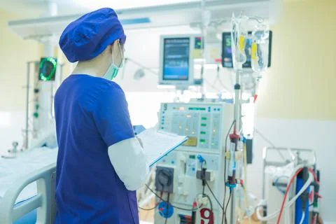 The specialist are checking continuous renal replacement therapy equipment an Stock Photos