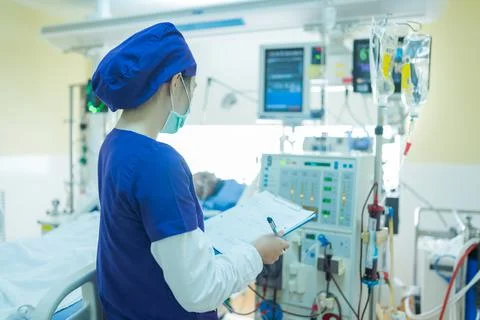 The specialist are checking continuous renal replacement therapy equipment an Stock Photos