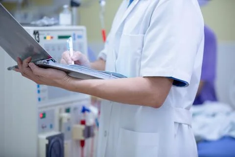 The specialist are doing continuous renal replacement therapy equipment and i Stock Photos