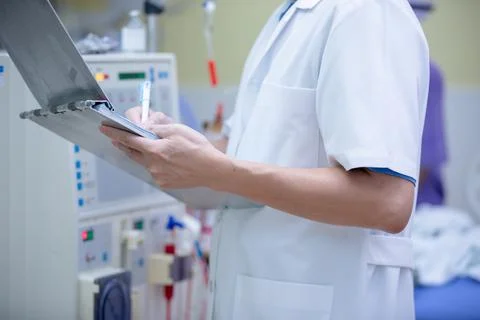 The specialist are doing continuous renal replacement therapy equipment and i Stock Photos