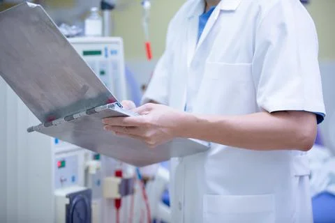 The specialist are doing continuous renal replacement therapy equipment and i Stock Photos